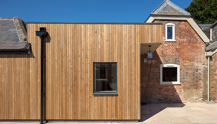 Grade II listed farmhouse extension - Brimstone cladding