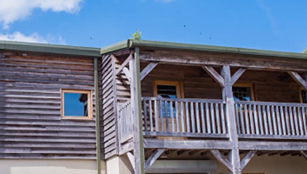 Exterior of home showing with Vastern wooden panelling.