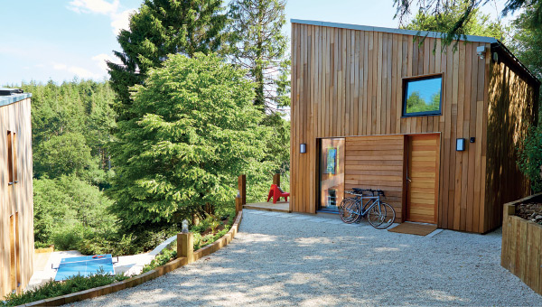 Photo of house with wood cladding detail.