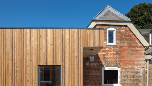 Image of house with wood cladding detail.